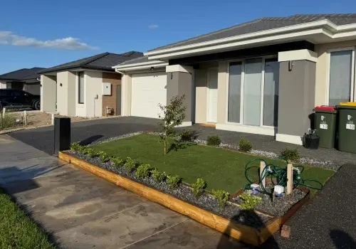 Homeowner reviewing outdoor project plans before landscaping work begins