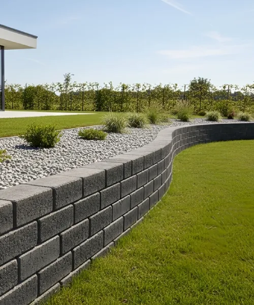Retaining wall construction planned with site levels, drainage and structural needs in mind