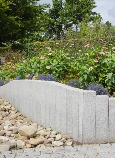 Detailed garden work with neat planting, mulch and carefully finished edges