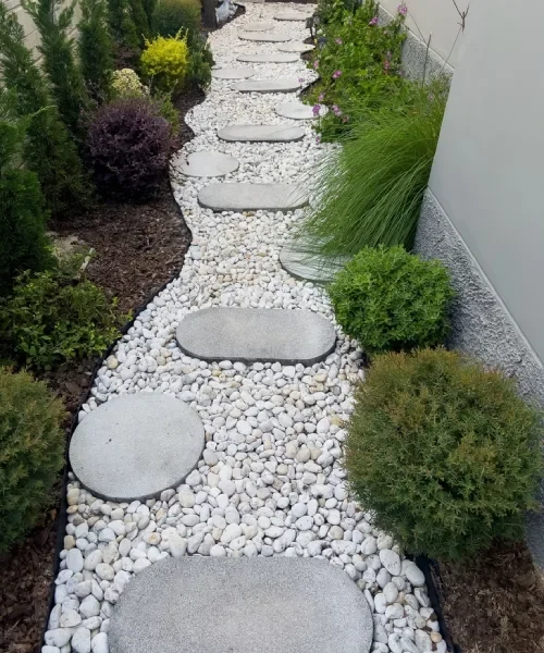 Paved outdoor area creating a practical surface for walking, seating and outdoor living