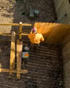 Owner overseeing landscaping work to maintain quality and project detail