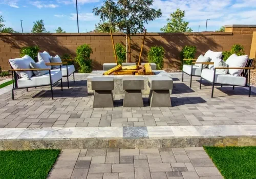 Stone and concrete paving installed for a clean residential pathway and outdoor surface