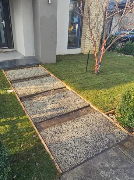 Landscaper providing practical guidance during a residential site assessment