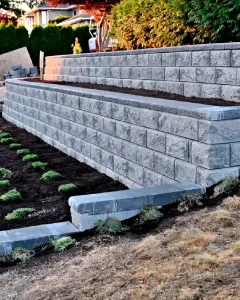 Timber sleeper and concrete sleeper retaining wall options for residential landscaping